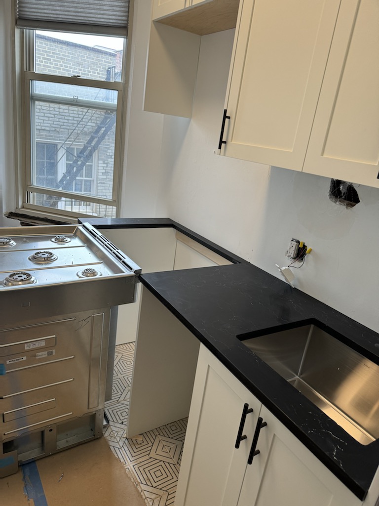 Cabinetry and fixture installation — 3
